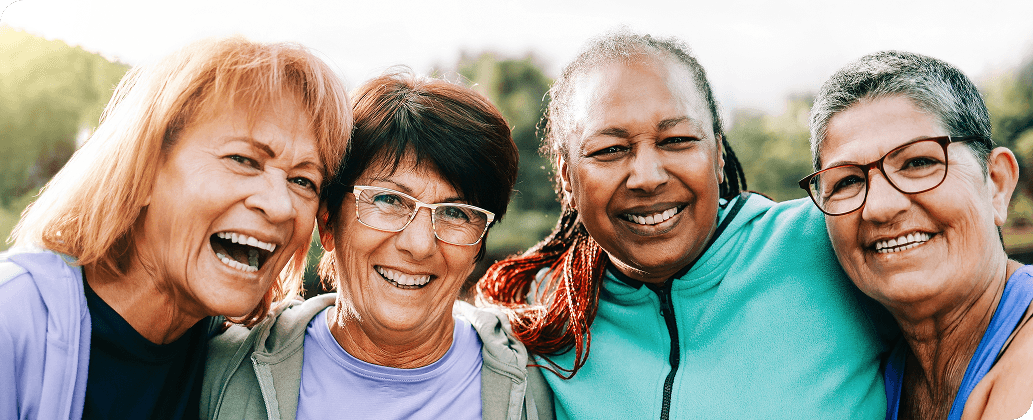 Group of 4 women smiling
