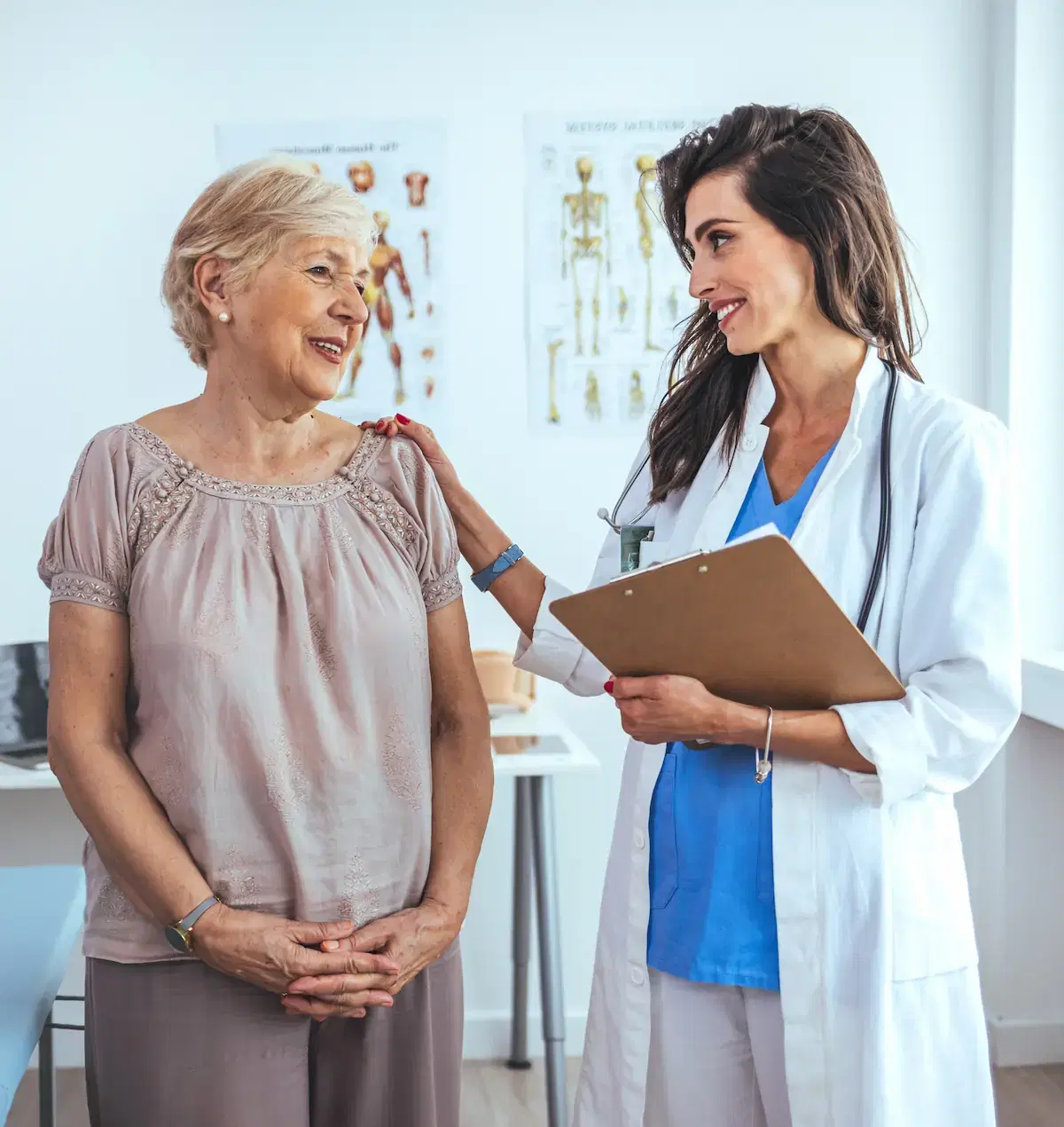 Women's health physician with patient