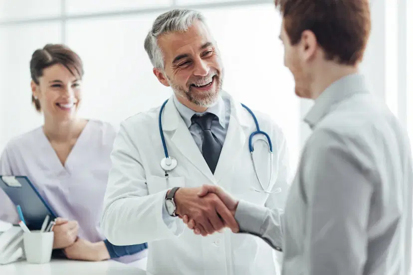 Healthcare professionals with patient