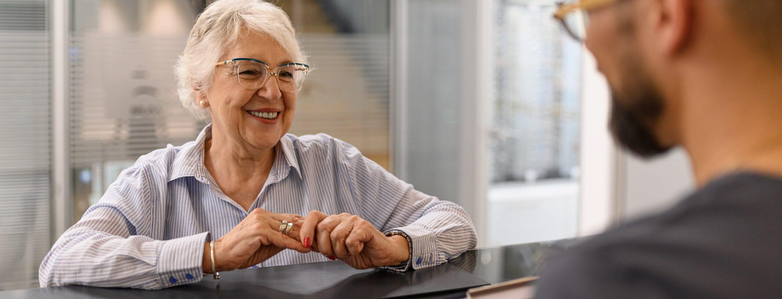 Patient speaking with a Russell Medical team member